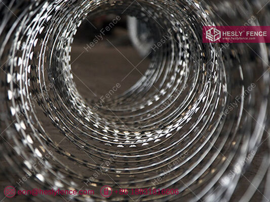 ملف سلك شفرة كونسييرتينا بقطر 1100 مم، BTO-16، شفرة 16 مم، مجلفن بالغمس الساخن، مبيعات مصنع HeslyFence الصين المزود